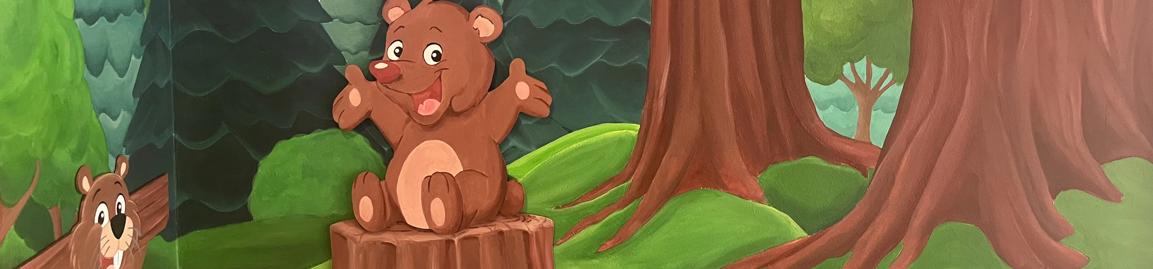 A cartoon bear sits contentedly on a stump surrounded by trees in a serene woodland setting.