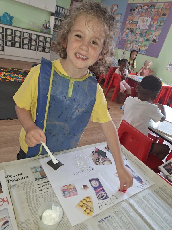 A cheerful young girl holds a paintbrush, her smile reflecting joy and passion for artistic expression. A cheerful young girl holds a paintbrush, her smile reflecting joy and passion for artistic expression.