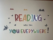 An open book with magical scenes popping out, symbolizing how reading can transport you to different adventures and places.